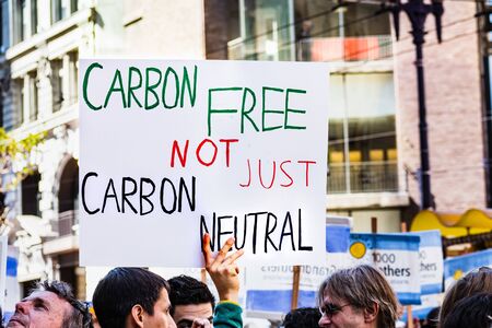 Sep 20, 2019 San Francisco / CA / USA - Carbon Free not just Carbon Neutral placard raised at the Global Youth Climate Strike Rally and March in downtown San Francisco;のeditorial素材