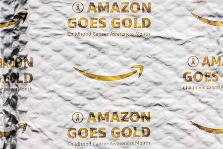 September 11, 2019 Sunnyvale / CA / USA - Amazon is helping raise awareness by using uniquely designed delivery envelopes, featuring the gold ribbon, the international symbol of childhood cancerのeditorial素材