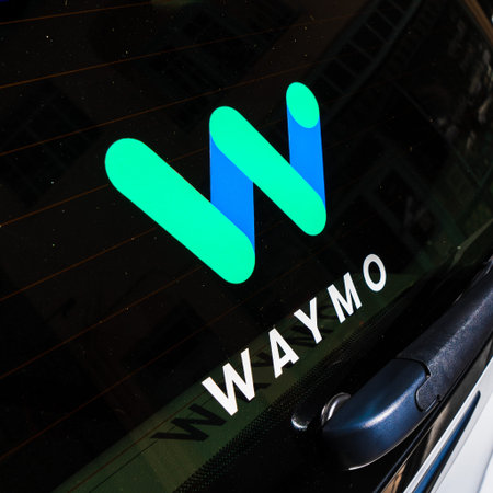 August 29, 2019 Sunnyvale / CA / USA - Close up of Waymo logo on the rear glass on one of their self...