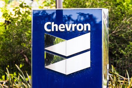 Sep 25, 2019 San Ramon / CA / USA - Chevron sign at their corporate headquarters in San Francisco bay area; Chevron Corporation is an American multinational energy corporationのeditorial素材