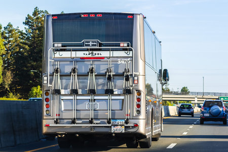Oct 24, 2019 Mountain View / CA / USA - Facebook commuter shuttle driving on the carpool lane on...