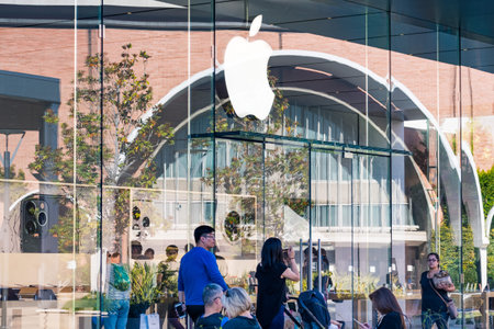 Nov 4, 2019 Palo Alto / CA / USA - Apple store facade in Silicon Valley; people visible both outside...