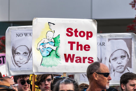 January 4, 2020 San Jose / CA / USA - Close up of Stop The Wars sign raised at the anti-war protest in front of the Cityhall in downtown San Jose;のeditorial素材