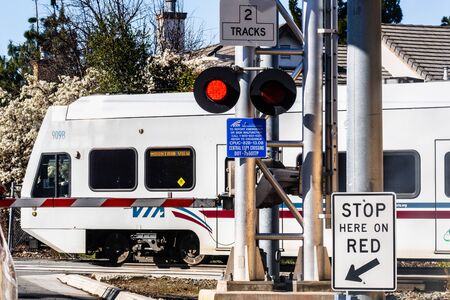 Feb 2, 2020 Mountain View / CA / USA - VTA Train crossing a street in south San Francisco bay; VTA Light Rail is a system serving San Jose and surrounding cities in Silicon Valleyのeditorial素材