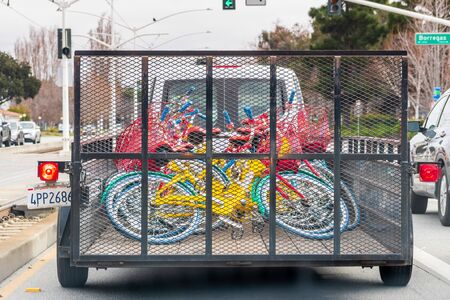 Jan 27, 2020 Sunnyvale / CA / USA - Google bikes loaded into a trailer, transported to another Google office locationのeditorial素材