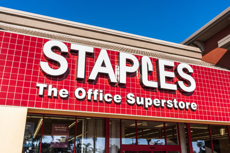 Feb 14, 2020 Milpitas / CA / USA - Staples, The office superstore sign above the entrance to one of...