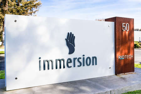 Feb 27, 2020 San Jose / CA / USA - Immersion logo at their Silicon Valley headquarters; Immersion Corporation is a developer and licensor of touch feedback technology, also known as haptic technologyのeditorial素材