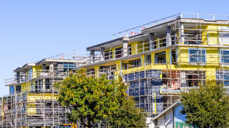 Feb 3, 2020 Mountain View / CA / USA - Multifamily residential building under construction; the...