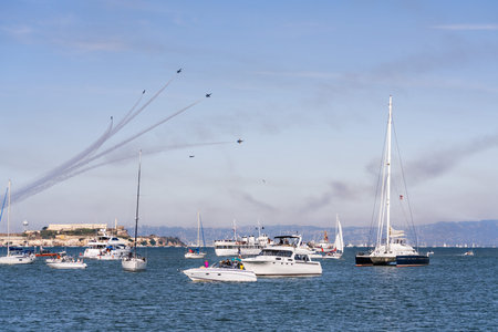 Oct 12, 2019 San Francisco / CA / USA - Visitors watching the Blue Angels airshow from private boats...