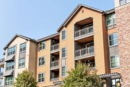 Exterior view of modern apartment building offering luxury rental units in Silicon Valley; Redwood City, San Francisco bay area, Californiaの写真素材