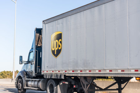 Jan 5, 2021 Concord / CA / USA - UPS (United Parcel Service) truck driving on the freeway in East...