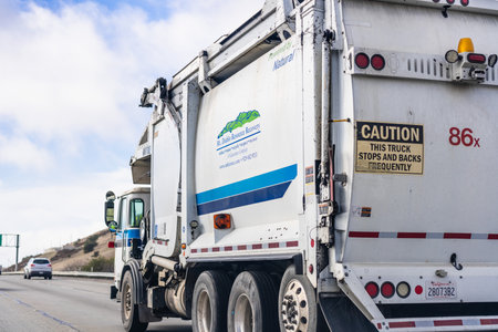 Jan 5, 2021 Antioch  / CA / USA - Mt Diablo Resource Recovery (MDRR) vehicle driving on the highway; MDRR is providing garbage hauling and recycling services to part of Contra Costa Countyのeditorial素材