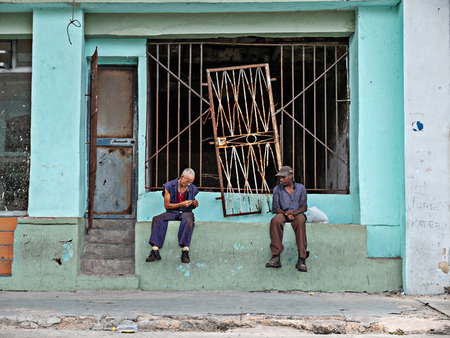 Havana, Cuba-June 6,2017: Scene two men converse in Havana.のeditorial素材