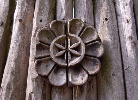 carving with wooden flower on the antique fence の写真素材