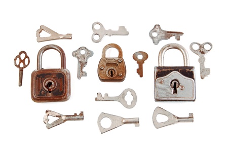 Old rusty padlock and key, isolated on white background の写真素材