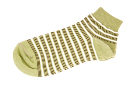 Striped green sock, isolated on white backgroundの写真素材