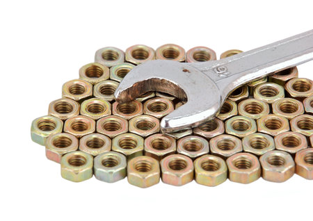 Screw nut and wrench, isolated on white background  
