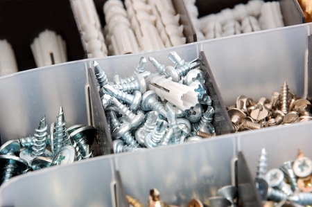 Screw and dowel in plastic organizer boxの写真素材