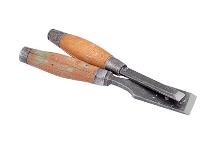 Old and rusty chisel, isolated on white background