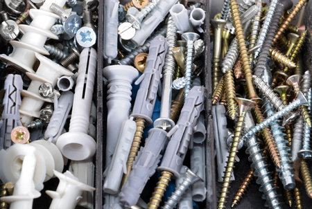 Screw and dowel in plastic organizer box