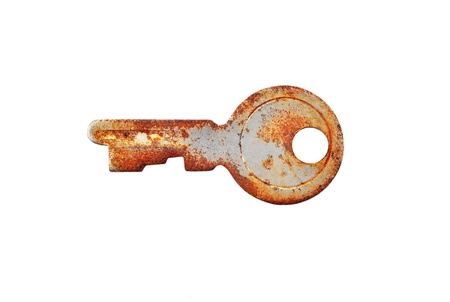 Vintage small rusty key, isolated on white backgroundの写真素材