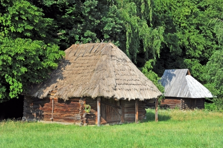 Ancient traditional ukrainian rural barn with a straw roofの写真素材