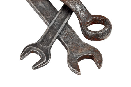 Old rusty wrench, isolated on white background