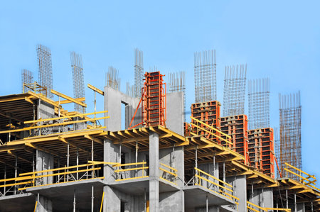 Building construction site work against blue sky