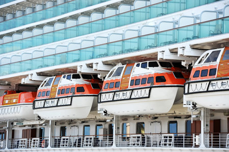 Safety lifeboat on deck of a cruise shipの写真素材