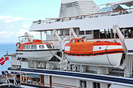 Safety lifeboat on deck of a cruise shipの写真素材