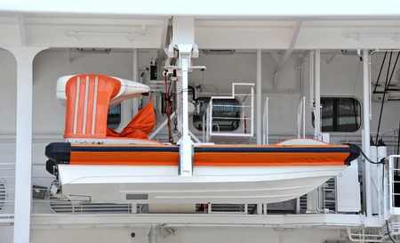 Safety lifeboat on deck of a cruise shipの写真素材