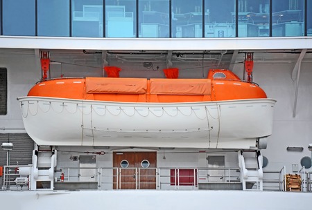 Safety lifeboat on deck of a cruise shipの写真素材