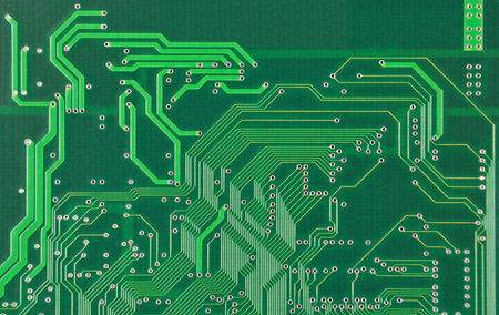 Close up of a printed green computer circuit board