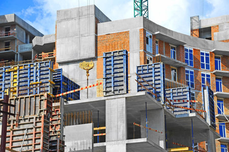 Concrete formwork with a folding mechanism and floor beams on construction site