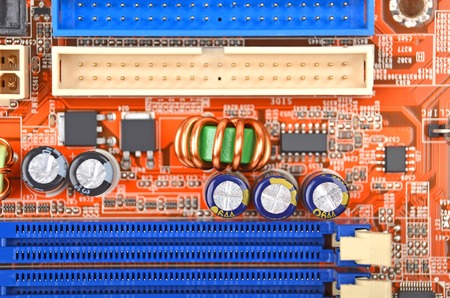 Printed computer motherboard with microcircuit, close up, DOF