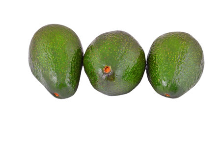 Some avocado fruit, isolated on a white background
