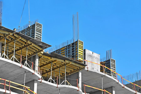 Building construction site work against blue sky