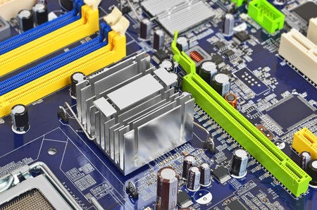 Printed computer motherboard with microcircuit, close up, DOF