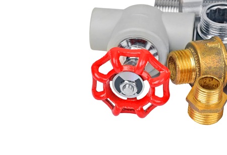 Plumbing fitting and tap, isolated on white backgroundの写真素材