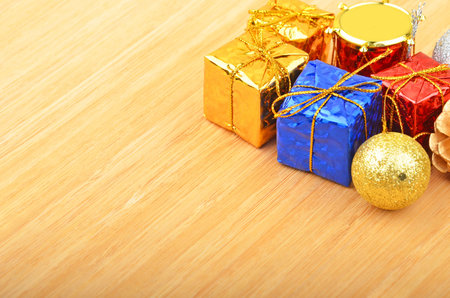 Christmas ball and decoration on wooden background
