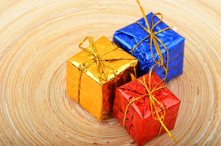 Christmas decoration gift box on wooden backgroundの写真素材
