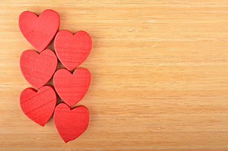 Red heart on wooden background, card for Valentine's dayの写真素材