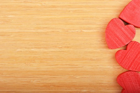 Red heart on wooden background, card for Valentine's dayの写真素材