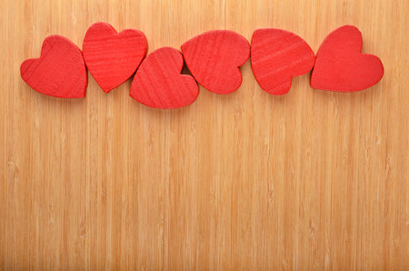 Red heart on wooden background, card for Valentine's dayの写真素材