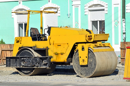 Asphalt paver on road construction siteの写真素材