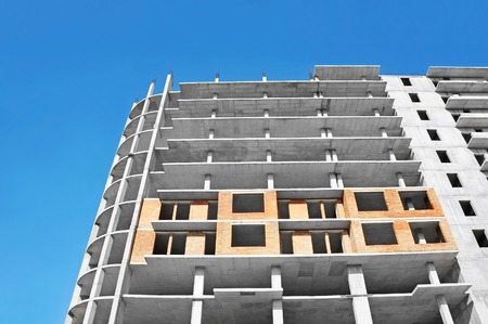 Building construction site work against blue skyの写真素材