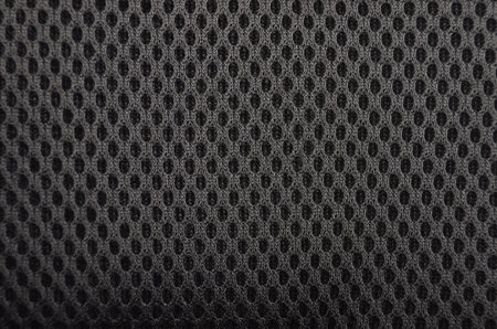 Close up of black textured synthetical backgroun