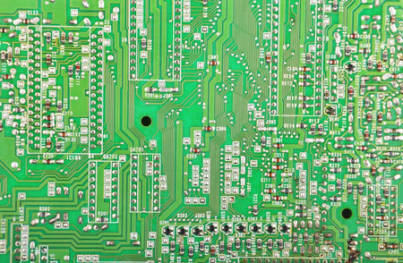 Close up of a printed green computer circuit board