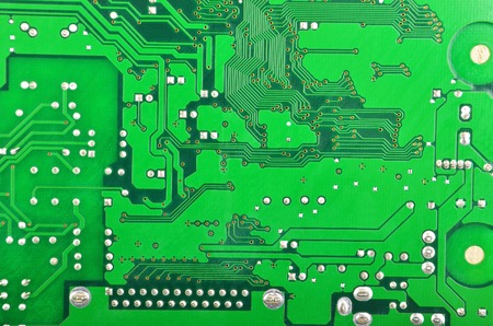 Close up of a printed green computer circuit boardの写真素材