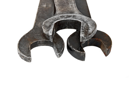 Stack of old rusty wrench, isolated on white backgroundの写真素材